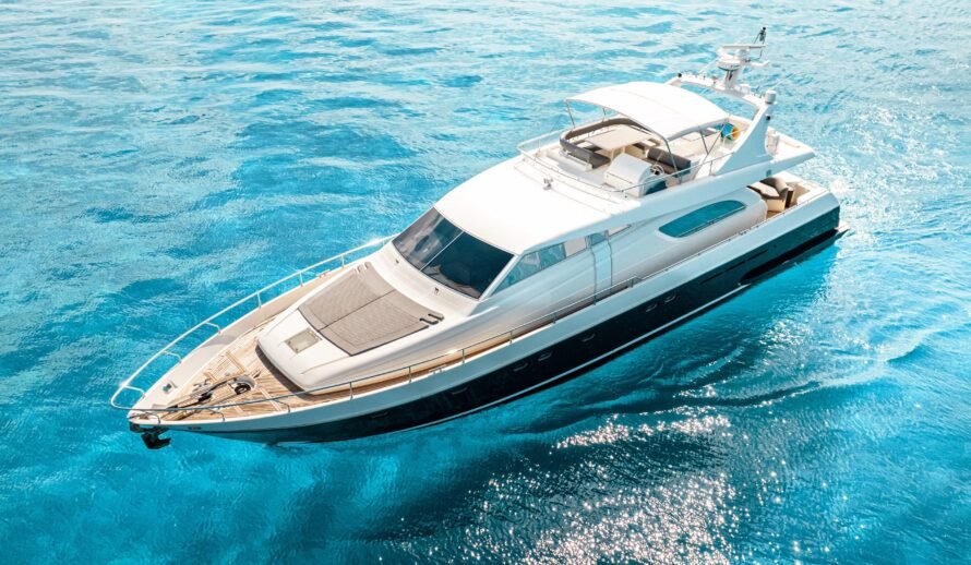 Ferretti 72 yacht top view in Cancun turquoise water aerial perspective