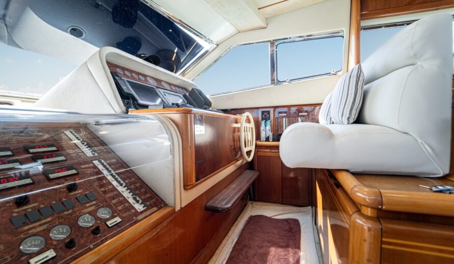 Ferretti 72 yacht helm station and navigation controls in Cancun