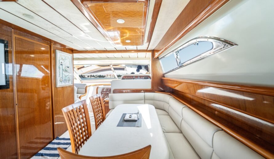Ferretti 72 yacht interior dining area with table in Cancun luxury yacht