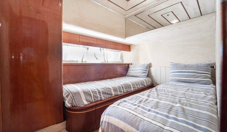 Ferretti 72 yacht guest cabin interior in Cancun with double bed